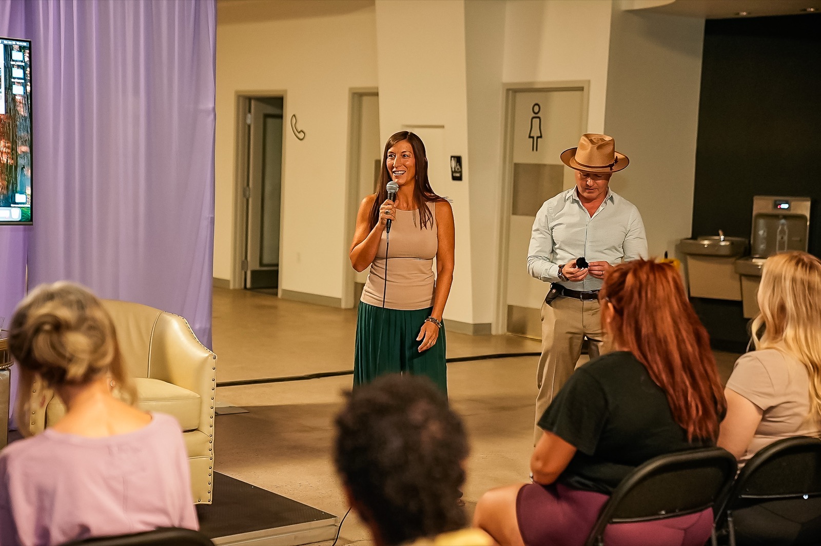 Erlinda and Teig welcome the room